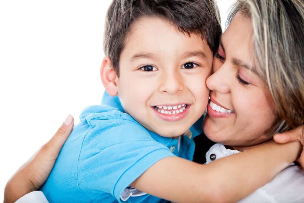 Affectionate mother and son - isolated over a white background