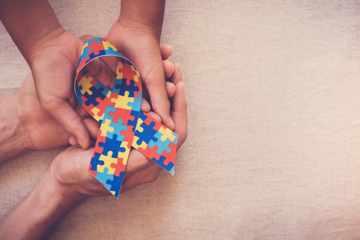 Autism Awareness Day ribbon with autism colors