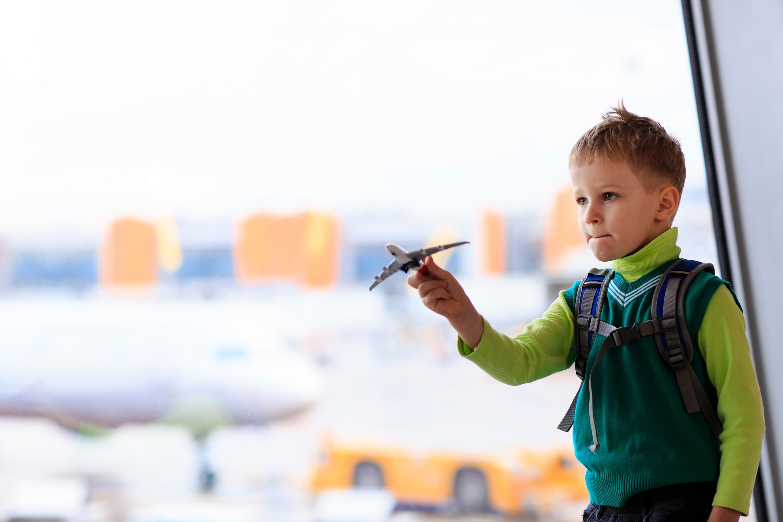 child-playing-airplane-student.jpg