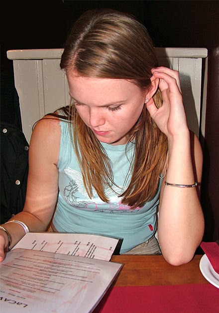 girl-reading-a-menu