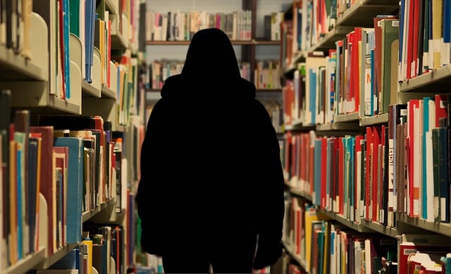 autistic person walking in bookstore