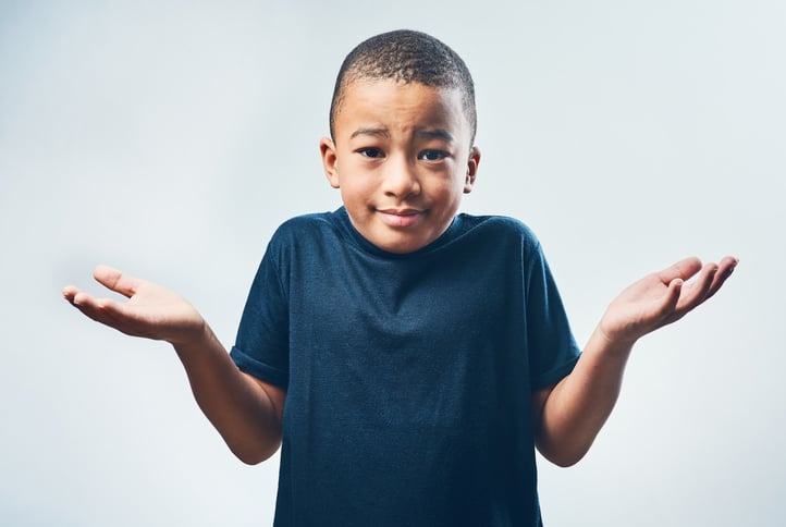 boy with autism looking confused