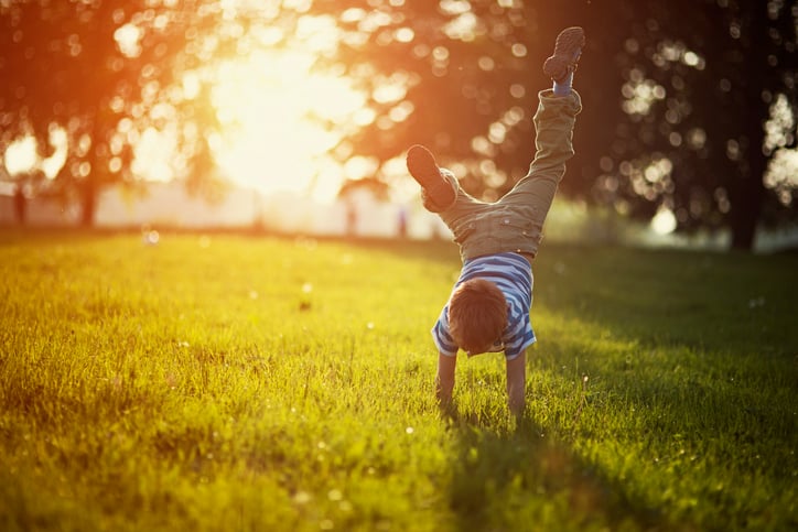 boy with autism playing outside