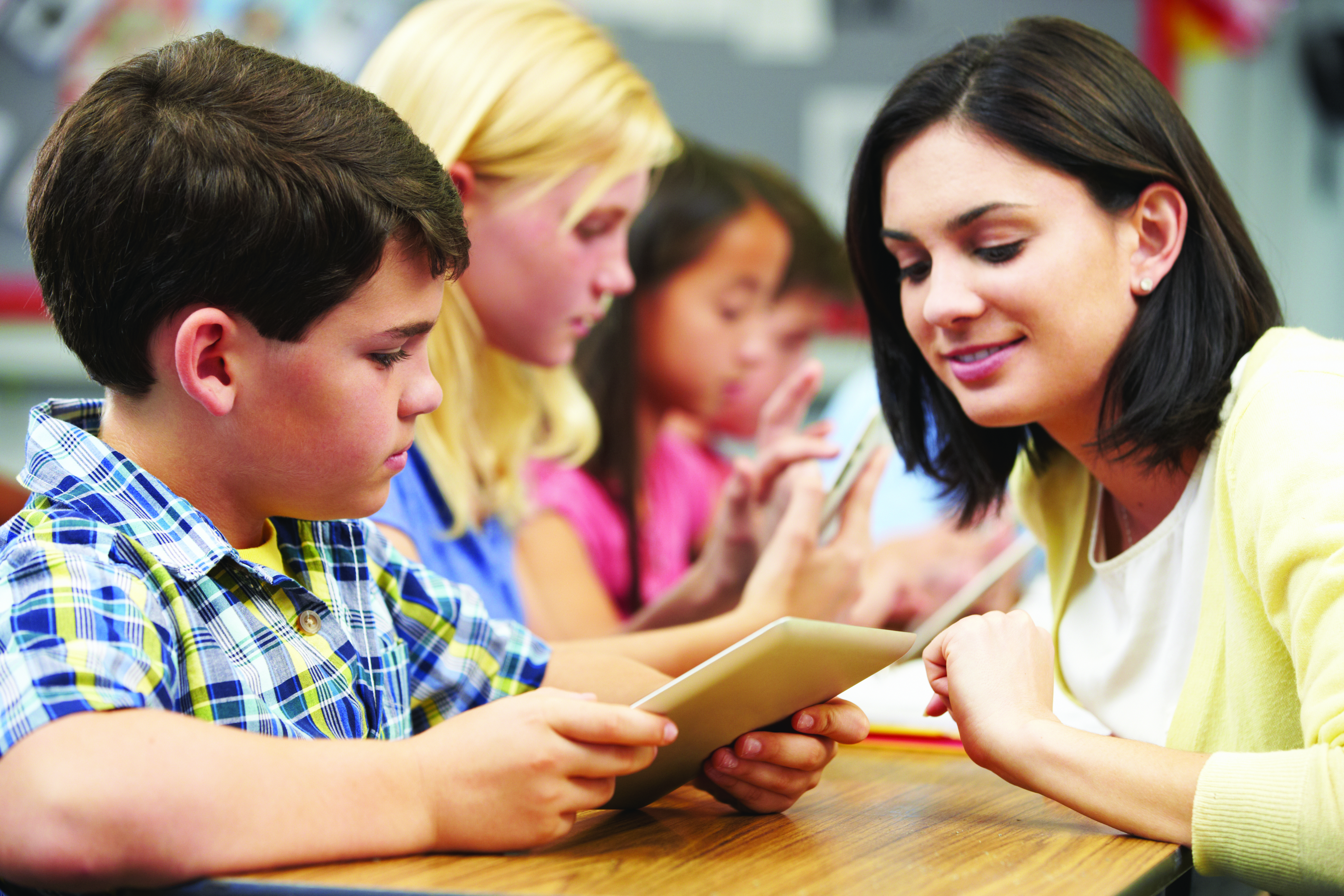 teacher using see.touch.learn webinar with autistic boy