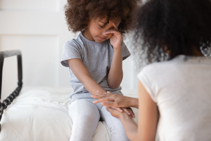 mother-comforting-frustrated-child