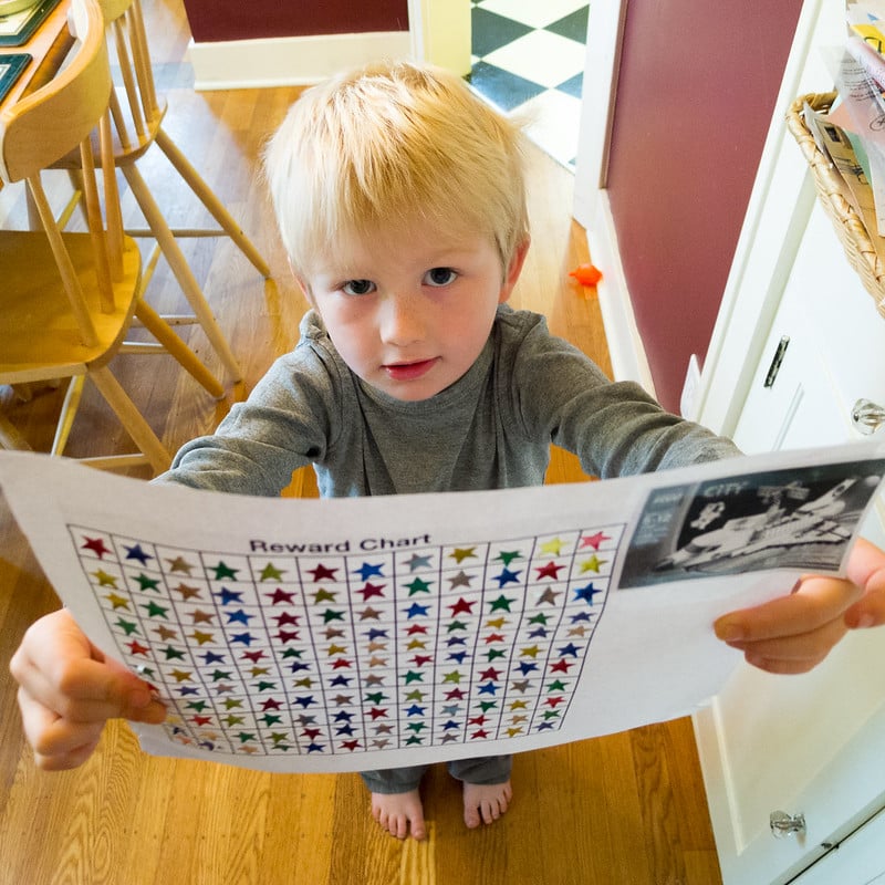 Child with Reward chart