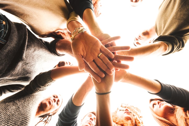 family hands in a circle