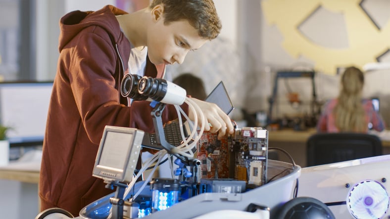 gifted boy with autism building a robot