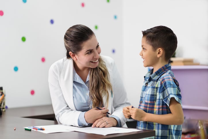 boy with autism taking language assessment
