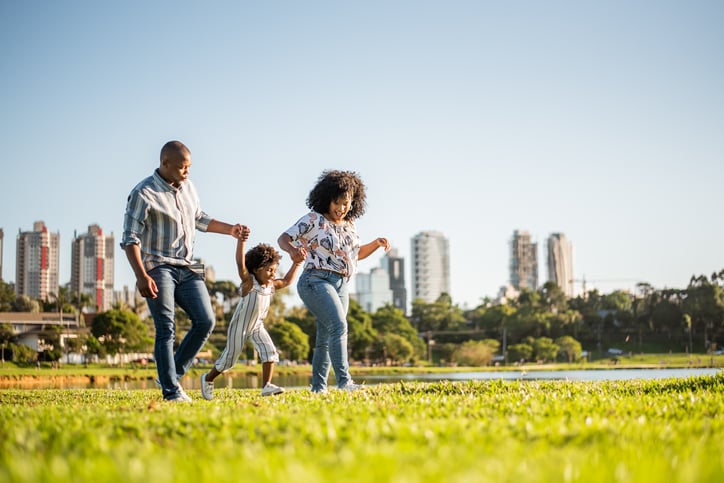 family exploring their neighborhood park