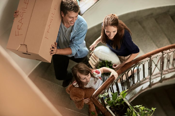 family exploring their new home