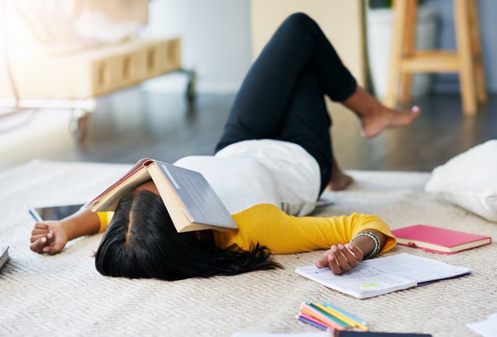 girl with ADHD napping taking a homework break