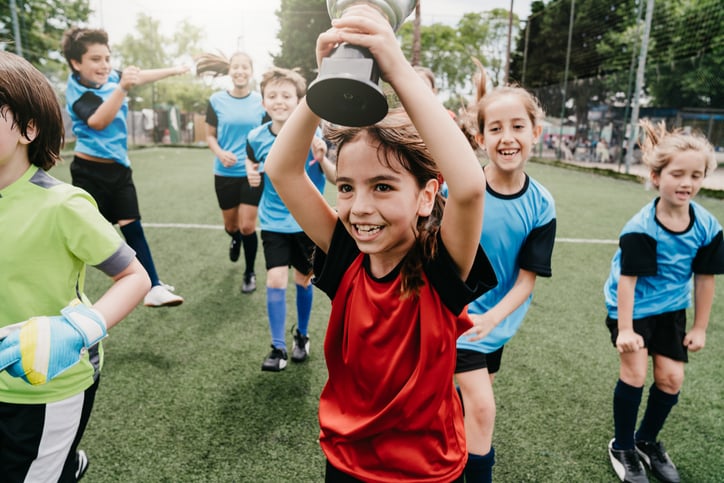girls with autism celebrating win after a soccer game