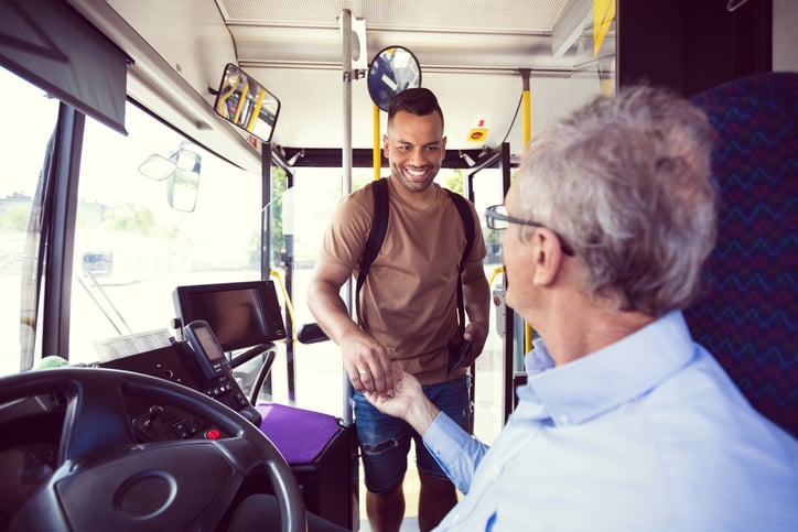 man with autism paying for the bus