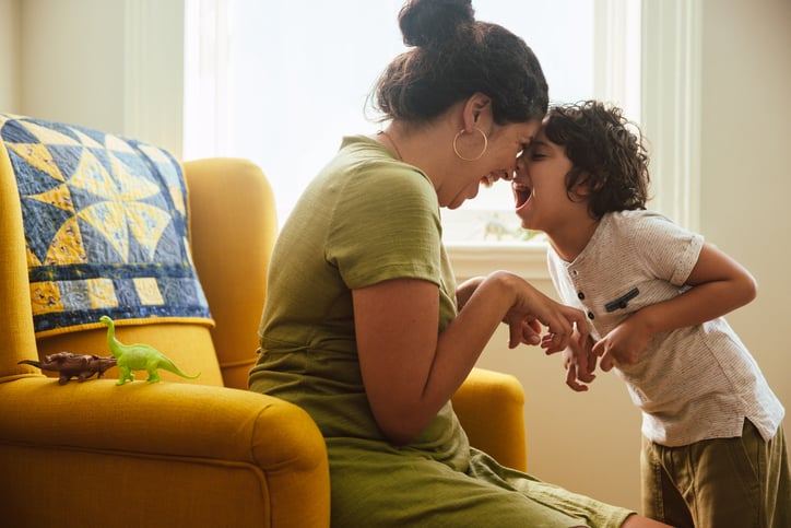 mother and son with autism imitating during play