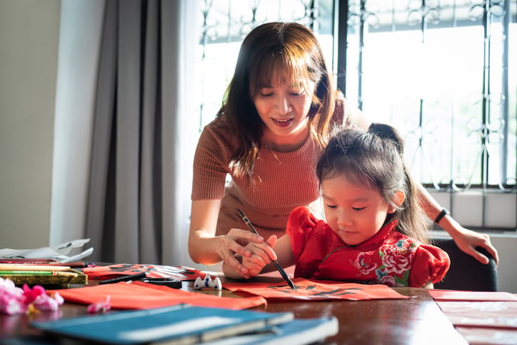 mother guiding daughter with autism PCIT