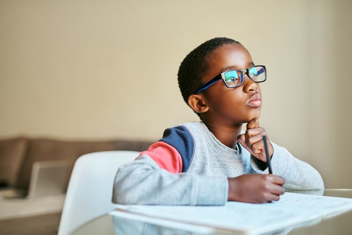 little boy with autism reflecting