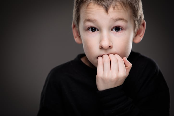 boy-orally-stimming-by-biting-fingernails