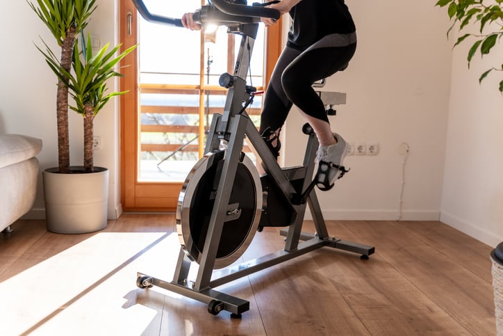 girl with autism using peloton bike