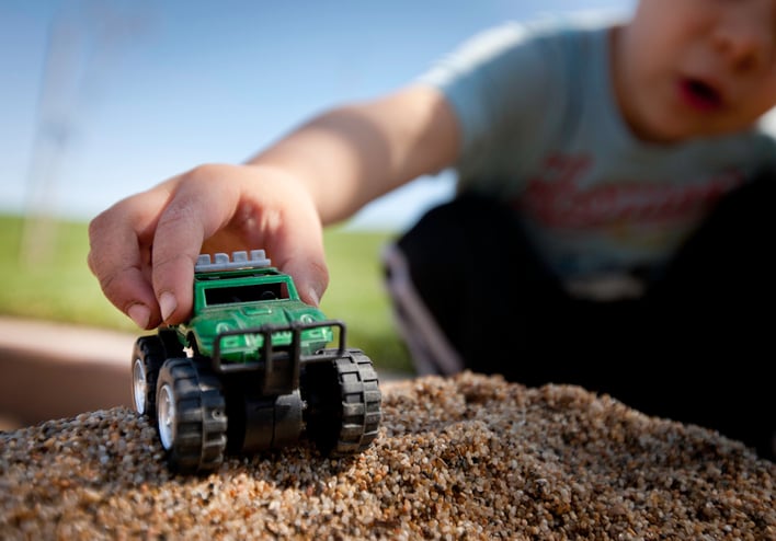 playing with a toy truck
