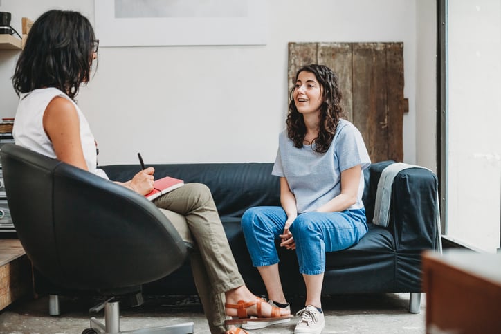 female student with autism receiving support services