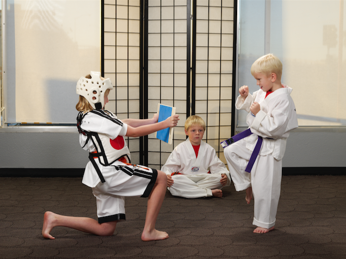 three-children-practicing-karate.png