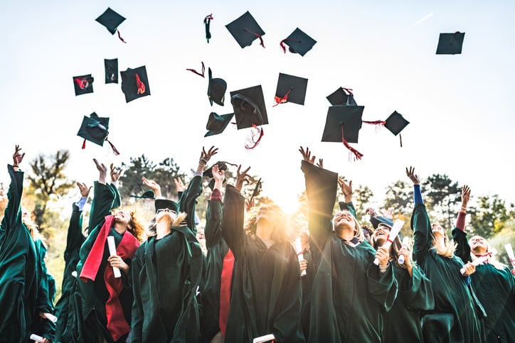university-students-graduating-throwing-caps-autism